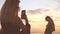 A young girl on the beach and takes pictures on the phone.