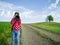 Young girl with big camera in rural Switzerland