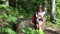 Young Girl with Binoculars at Camping in Mountains Trails Use Smartphone, Tourist Hiking, Adolescent in Adventure Trip Excursion