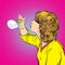 Young girl blowing soap bubbles