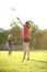 Young girl is catching a frisbee