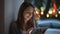 Young girl chatting on tablet .