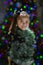 Young girl with Christmas tinsel around her