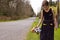 Young Girl Cleaning Up Roadside Environment