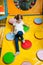 Young girl climbing down ramp in soft play centre