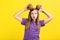 Young girl with coconuts