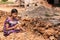 Young girl crushes limeston in Hunsur, Karnataka, India.