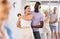 Young girl dancing merengue with African American partner