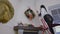 Young girl decorates christmas wreath over the fireplace