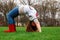 A young girl demonstrates a backbend