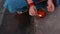 Young girl devotee lighting oil lamps to offer holy river ganges at evening from top angle