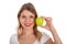 Young girl on diet holding a green apple