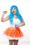 Young girl doll with blue hair. plastic eating a sandwich. hunger