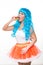 Young girl doll with blue hair. plastic eating a sandwich. hunger