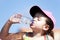 Young girl drinking water