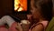 Young girl drinks hot chocolate with thick whipped cream layer