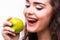 Young girl eat apple. Female teeth and apple.