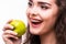 Young girl eat apple. Female teeth and apple.