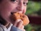 Young Girl Eating A Donut