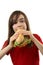 Young girl eating healthy sandwich