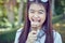 Young girl is eating ice cream and happy. At the time of relaxation