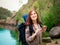 Young girl enjoying nature on backpacking trip in the mountains.