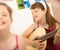 Young girl enjoying playing guitar