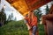 A young girl is enjoying the view from cottage porch in the forest. Vacation, nature, cottage