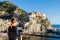 Young girl enjoying the view of Manarola in Cinque terre