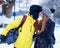 Young girl and fellow in winter in Trakai of Lithuania