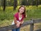 Young Girl on Fence