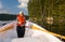 Young girl fishing from boat