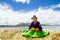 Young girl on a floating Uros island, Titicaca