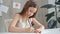 Young girl focused on drawing at the desk at home or school class room