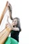 Young girl in green pants plays harp in studio