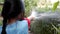 Young girl hand watering with tree in garden home, Daily lifestyle videography.