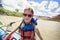 Young girl having fun on a river rafting trip down the Colorado River