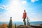 Young girl having a rest at the top of the mountain. Calm concept. Meditation. Nature loving