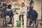 Young girl helping two disabled women in wheelchair in a department store