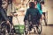 Young girl helping two disabled women in wheelchair in a department store