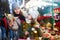 Young girl and her mother are choosing Christmas decorations