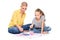 Young girl and her therapist in child occupational therapy session painting with watercolors. Child therapy concept.