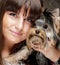 Young girl with her Yorkie puppy