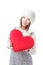 Young girl hold a love heart pillow