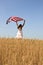 Young girl holding an American flag