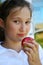 Young girl holding apple
