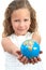 Young girl holding earth sphere.