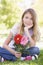 Young girl holding flowers