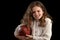 Young Girl Holding Football