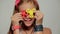 Young girl holding popular fidget spinner toy - close up portrait.